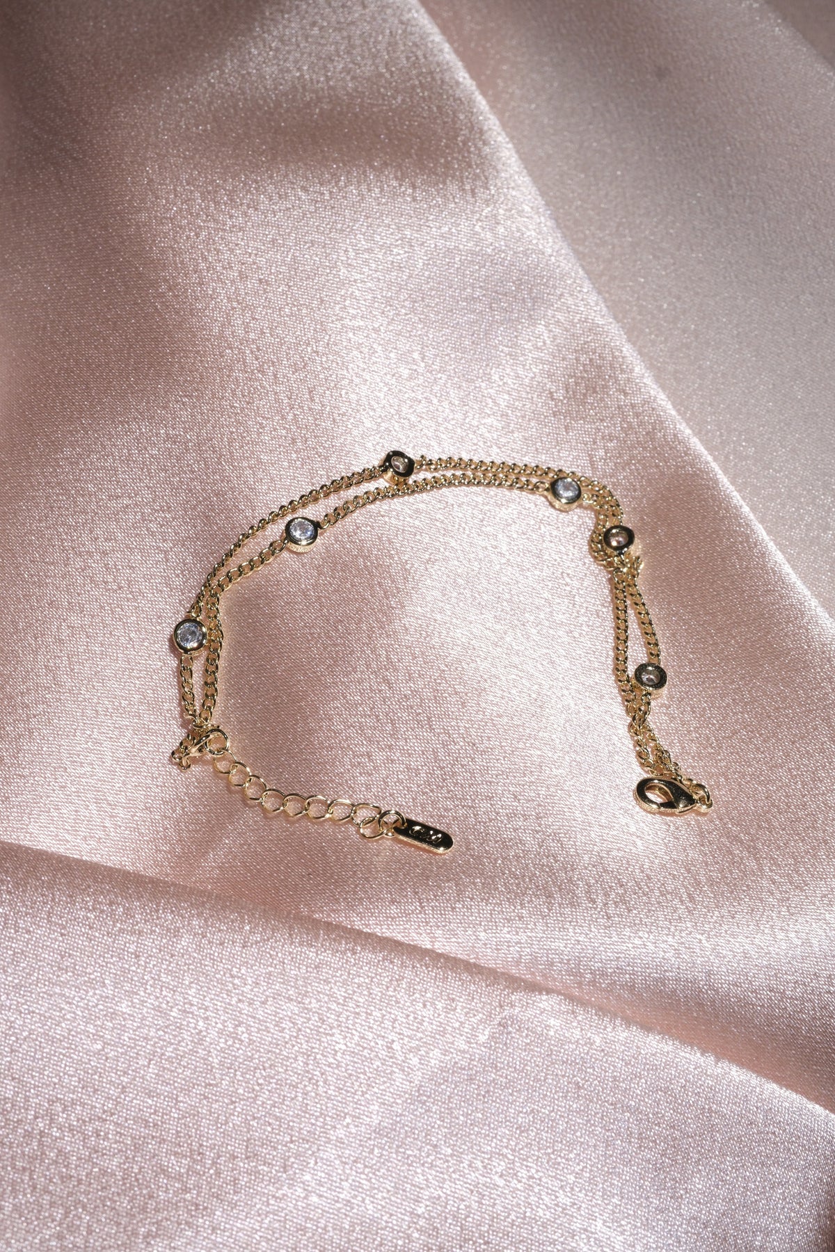 Dewdrop CZ Station Chain Bracelet — Gold Tone