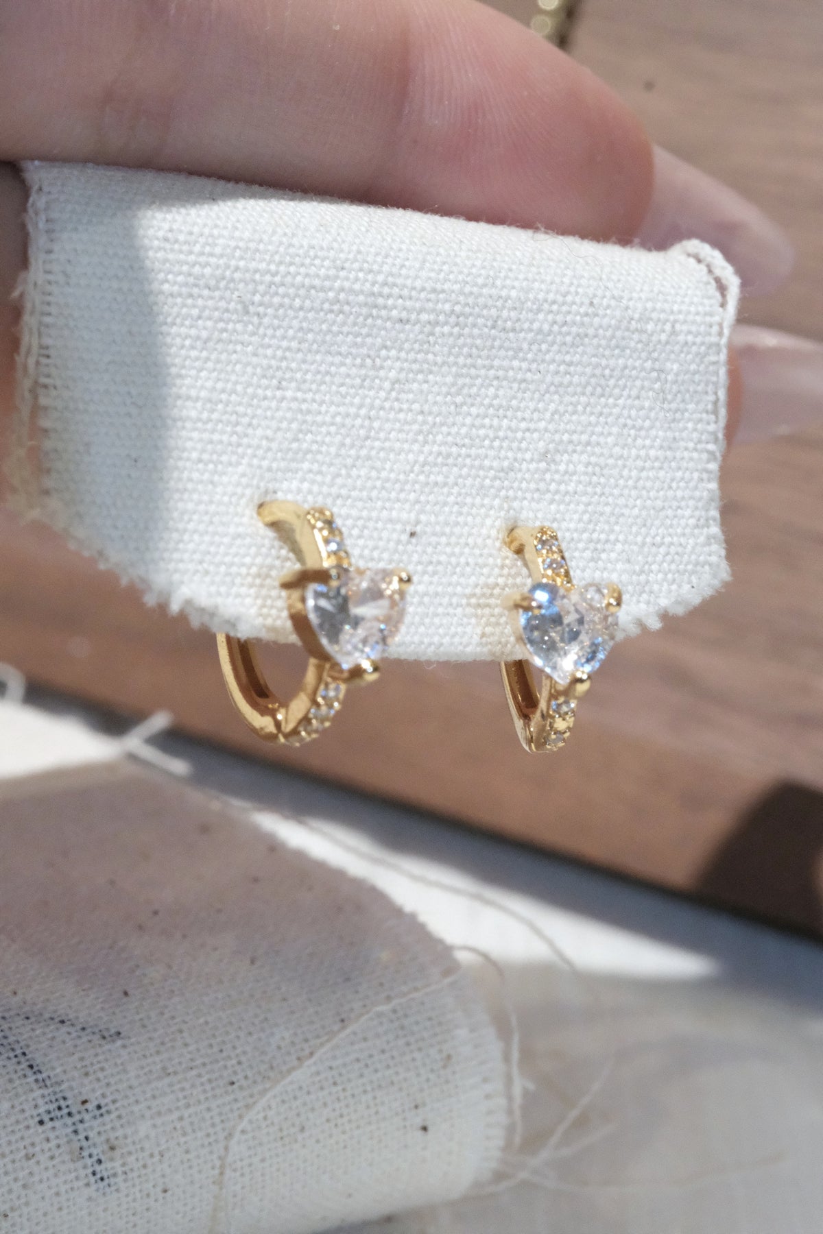 Three Stone CZ Huggie Earrings — Gold