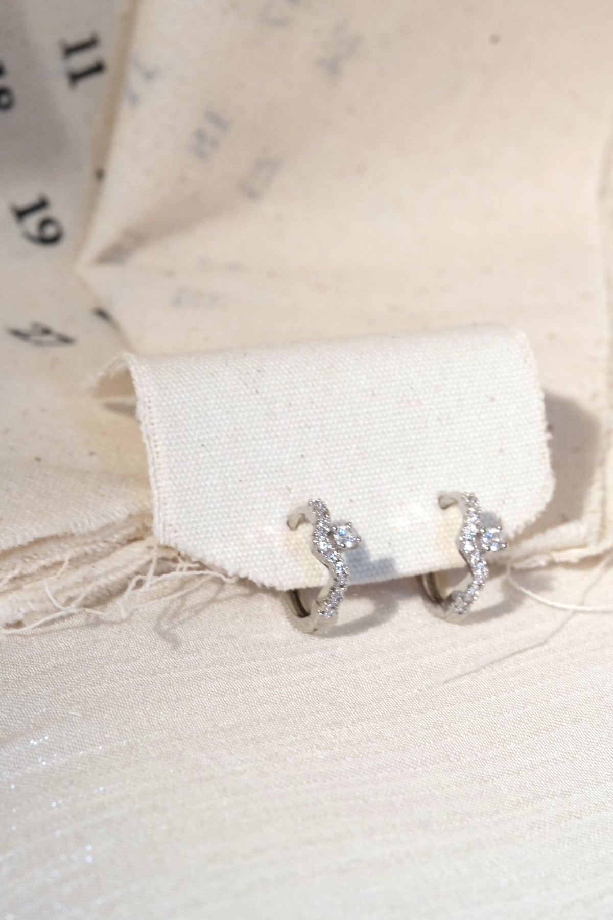Wave CZ Earrings — Silver