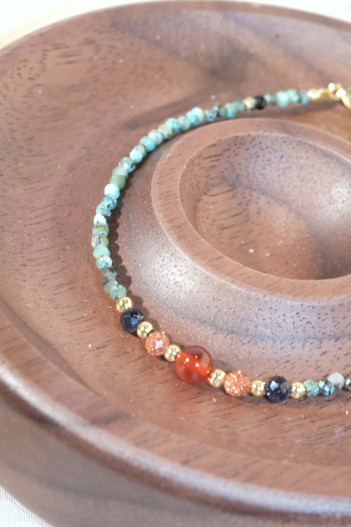 Green Red Orange Accents Bracelet — real product photo