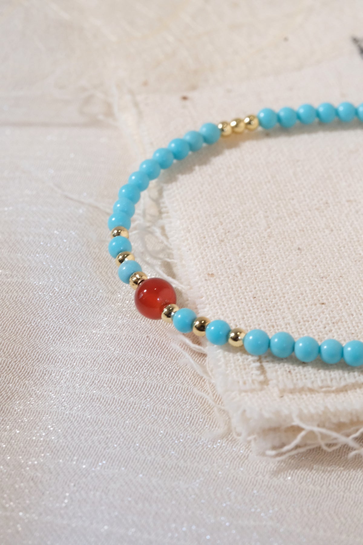 Turquoise Color Red Accents Bracelet — real product photo