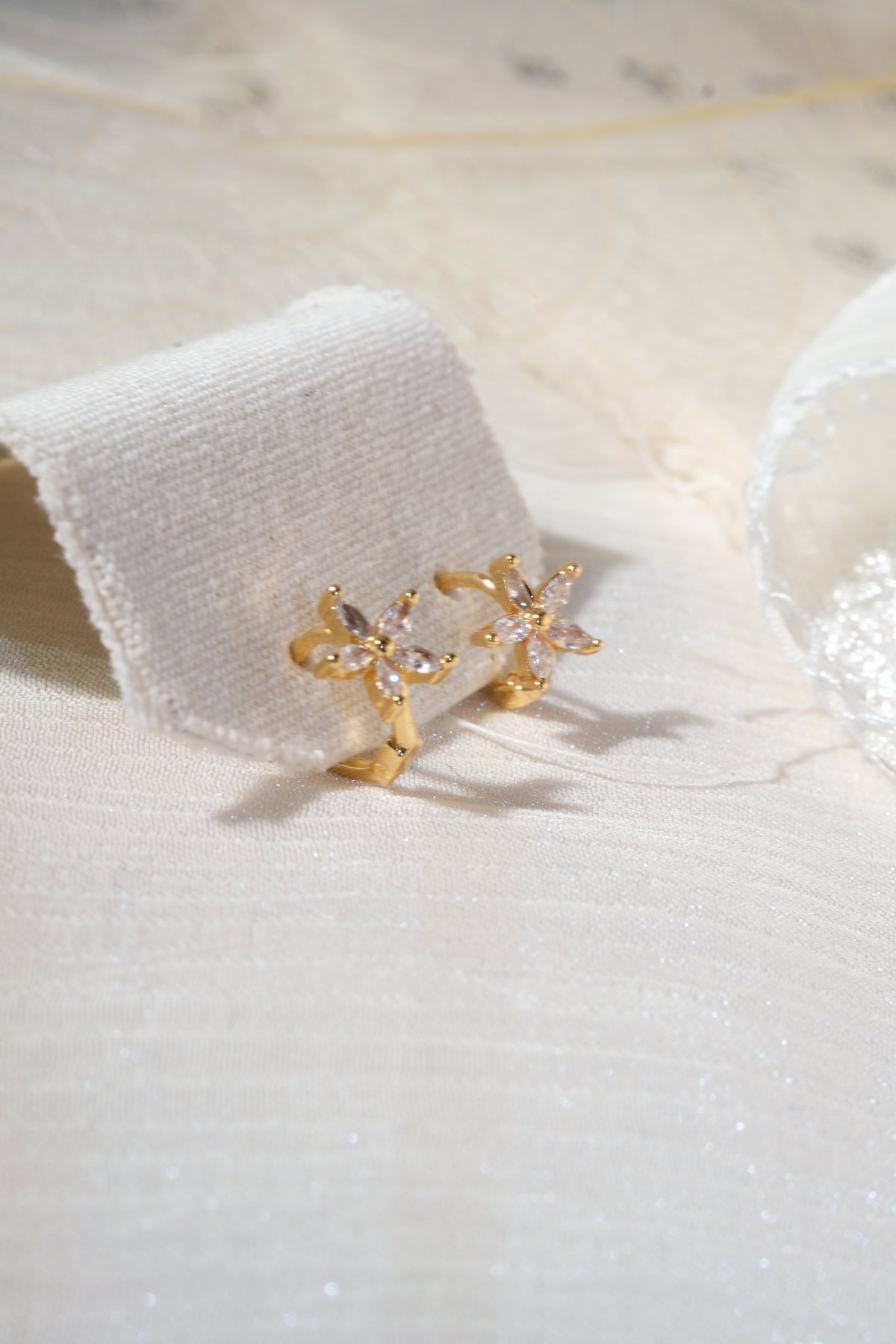 Gold Tone Five Petal Hoops Earrings — real product photo