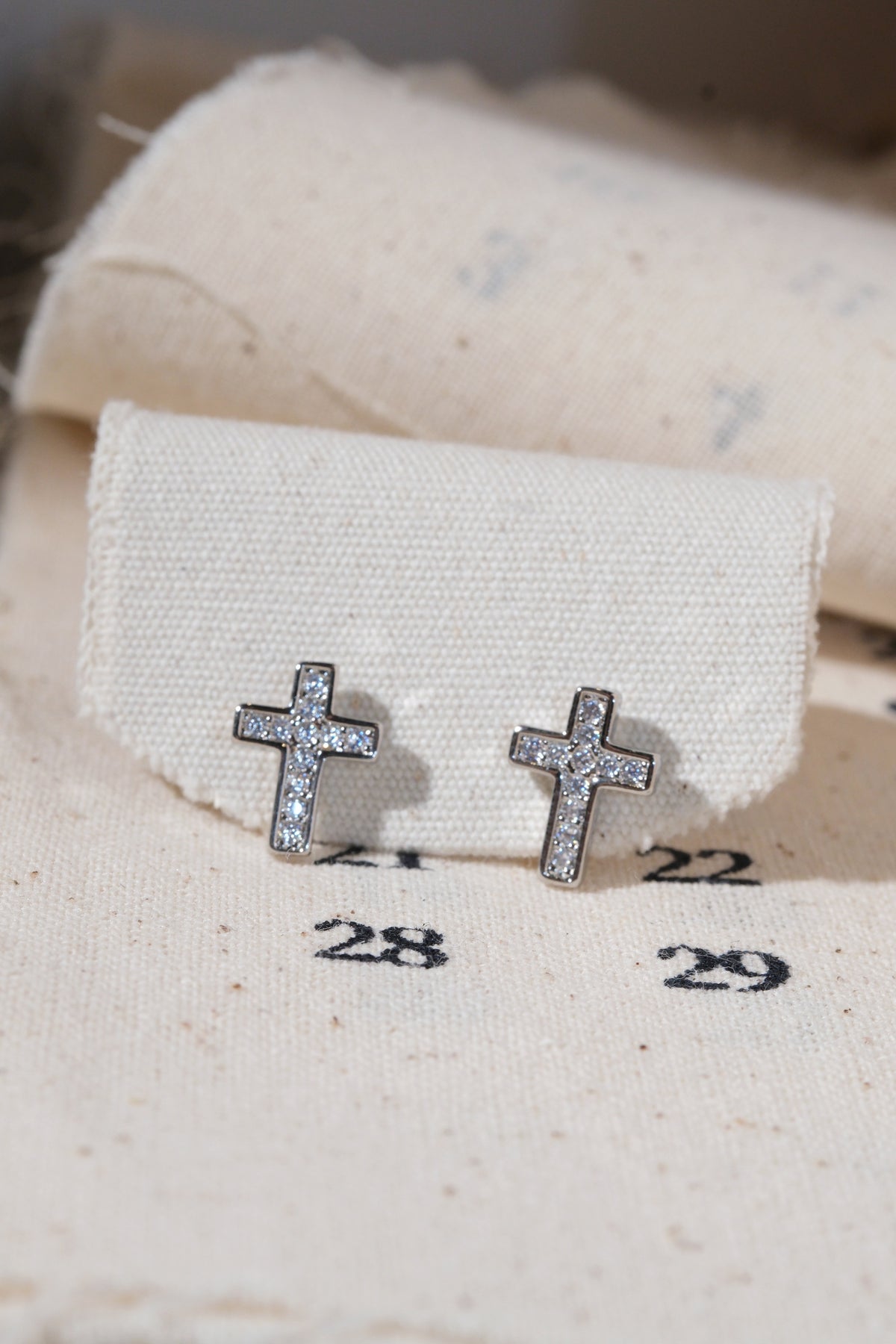 Silver CZ Cross Stud Earrings — edited real product photo