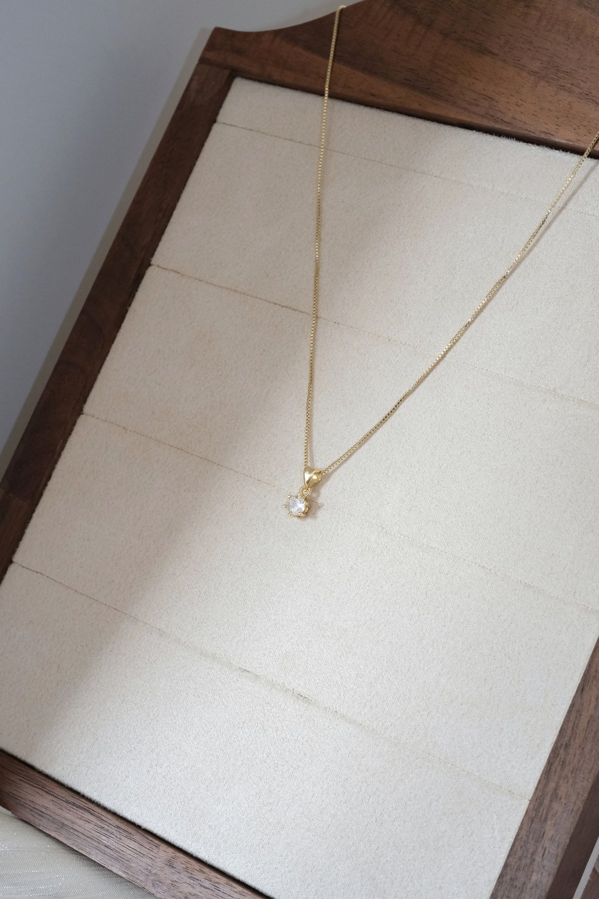Round Solitaire Pendant — Gold — edited real-life photo