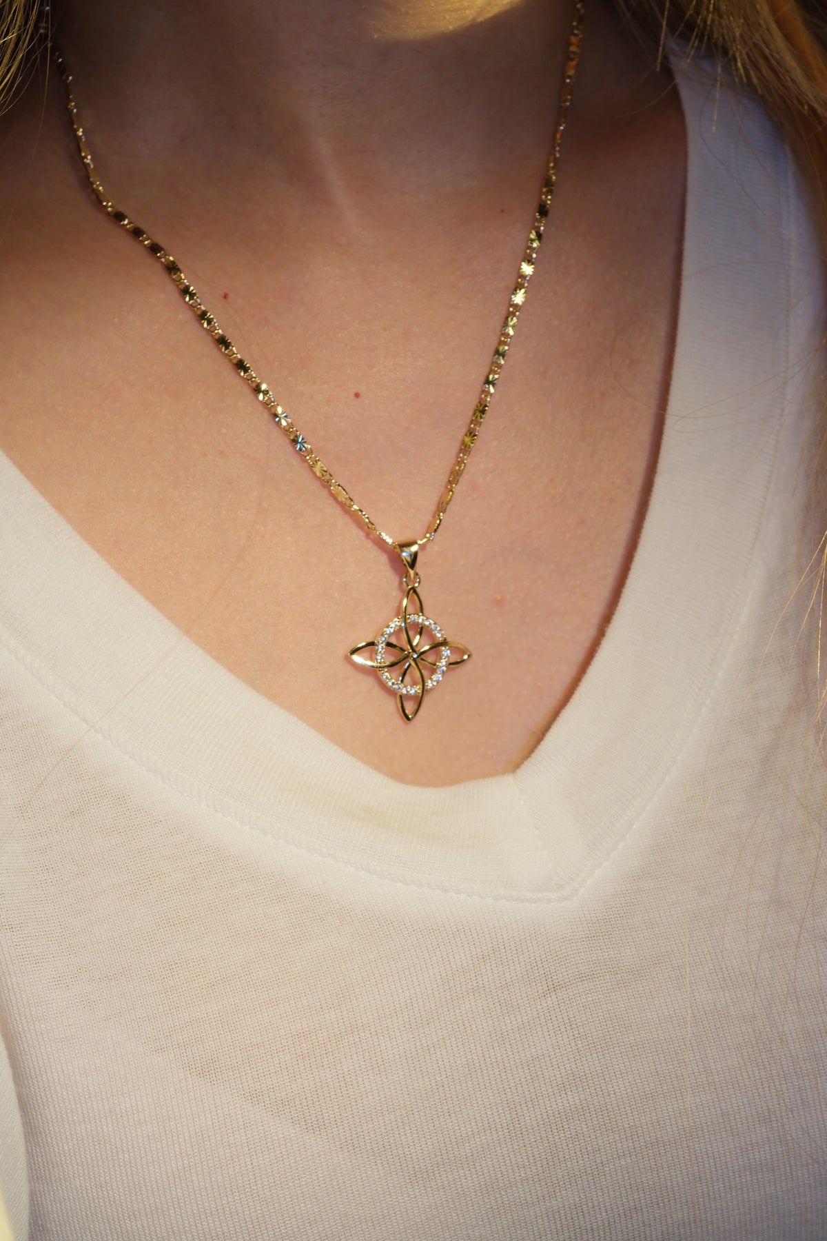Four Point Flower Pendant — Gold — edited real-life photo