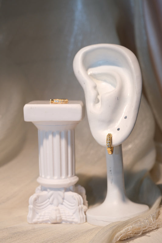 Classic CZ Huggie Earrings — Gold — real-life photo