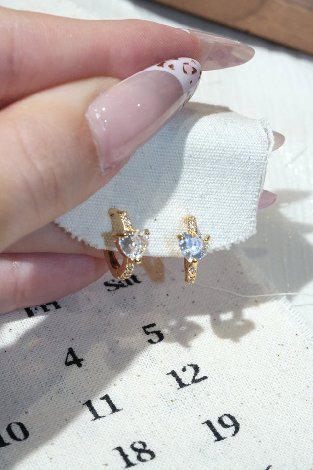 Three Stone CZ Huggie Earrings — Gold — worn