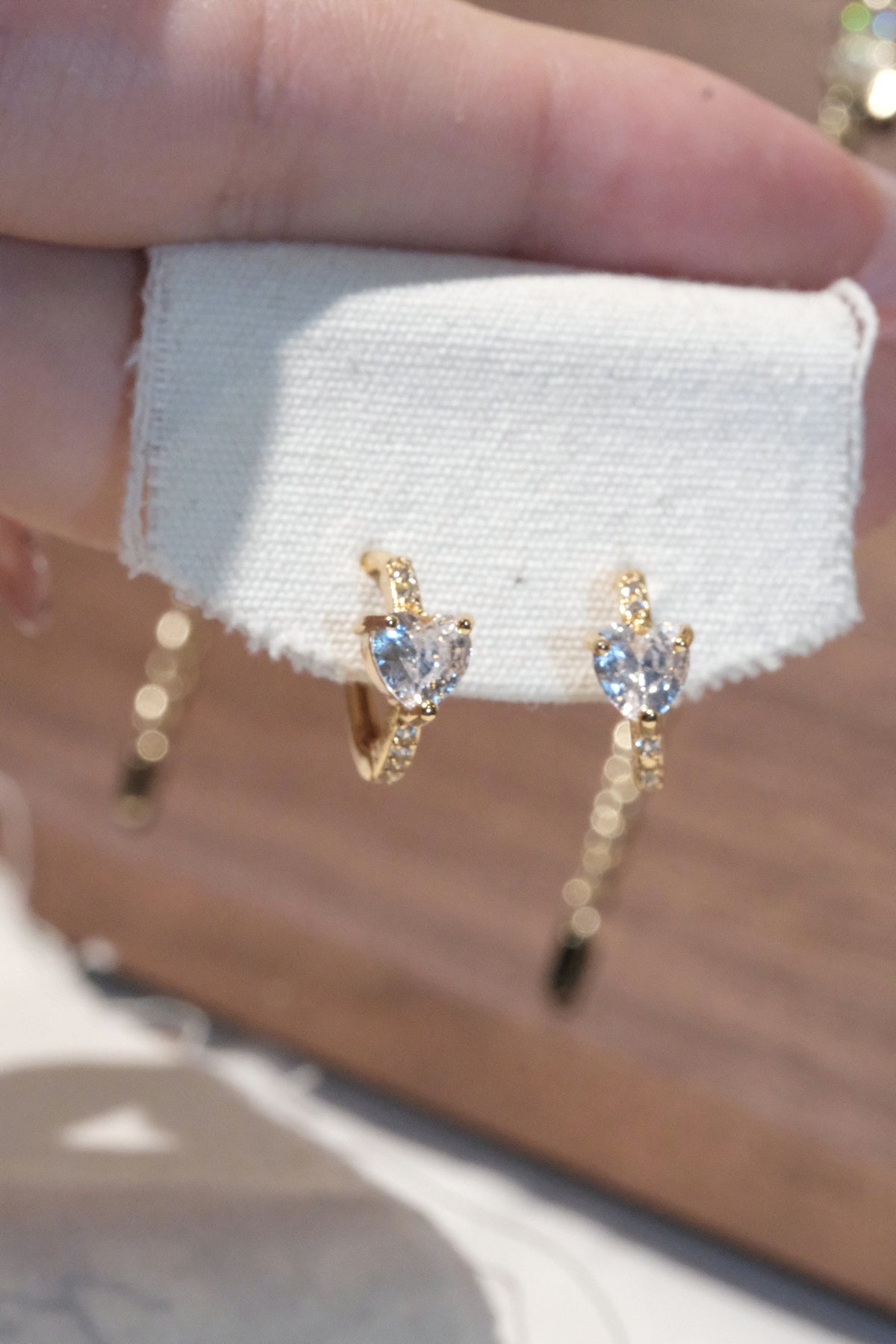 Three Stone CZ Huggie Earrings — Gold