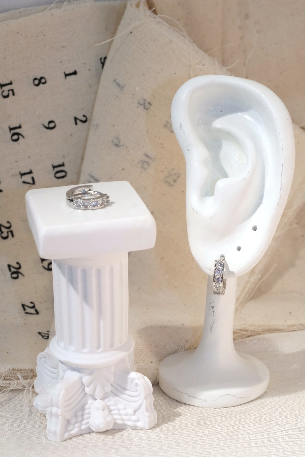 Five Stone CZ Huggie Earrings — Silver
