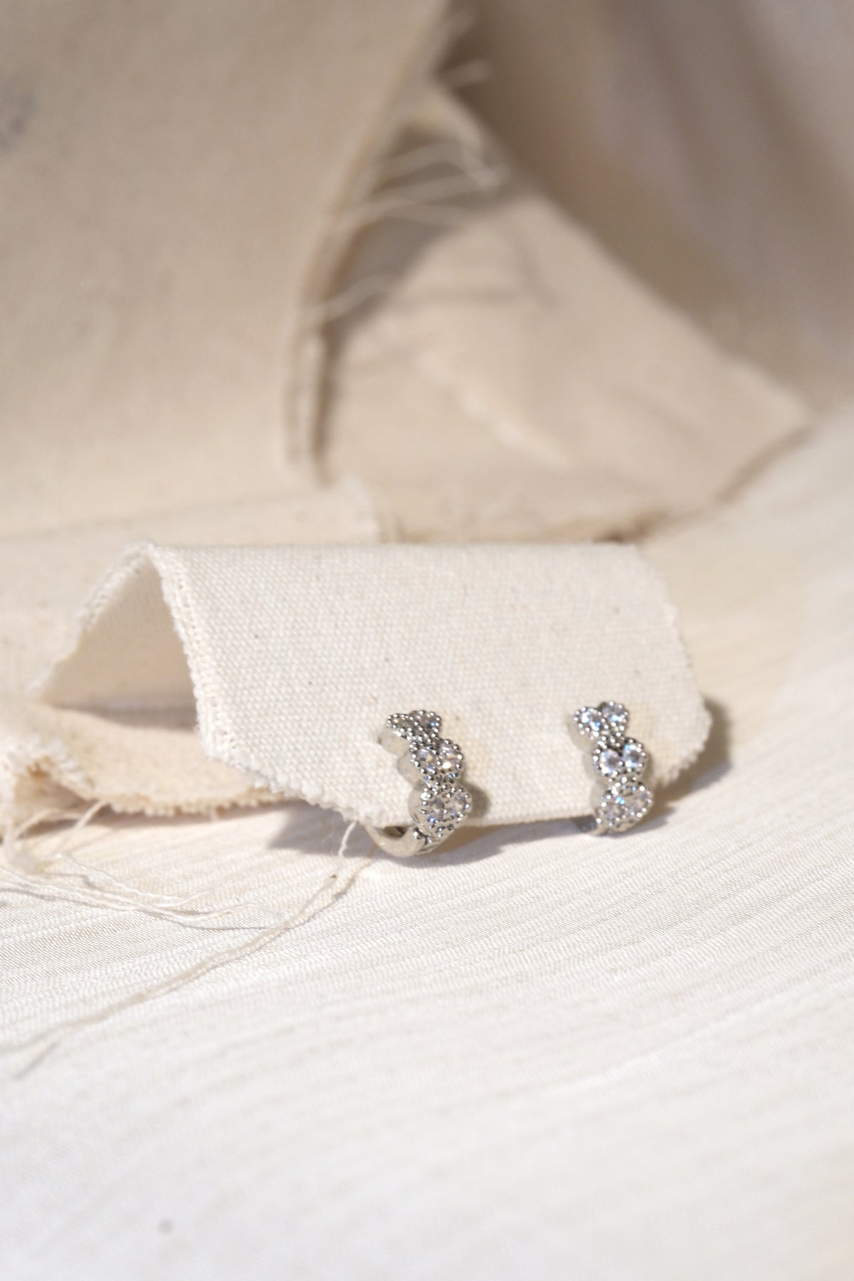 Petal CZ Huggie Earrings — Silver