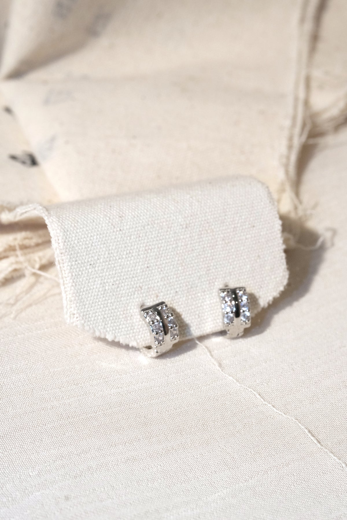 Six Stone CZ Huggie Earrings — Silver