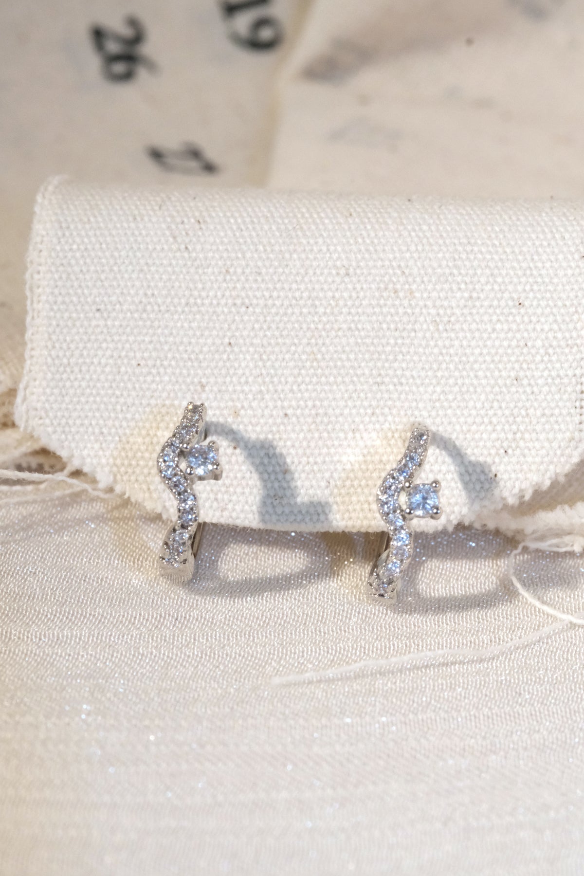 Wave CZ Earrings — Silver
