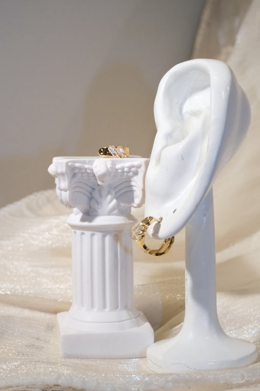 Offset Baguette CZ Huggie Earrings — Gold — edited real product photo