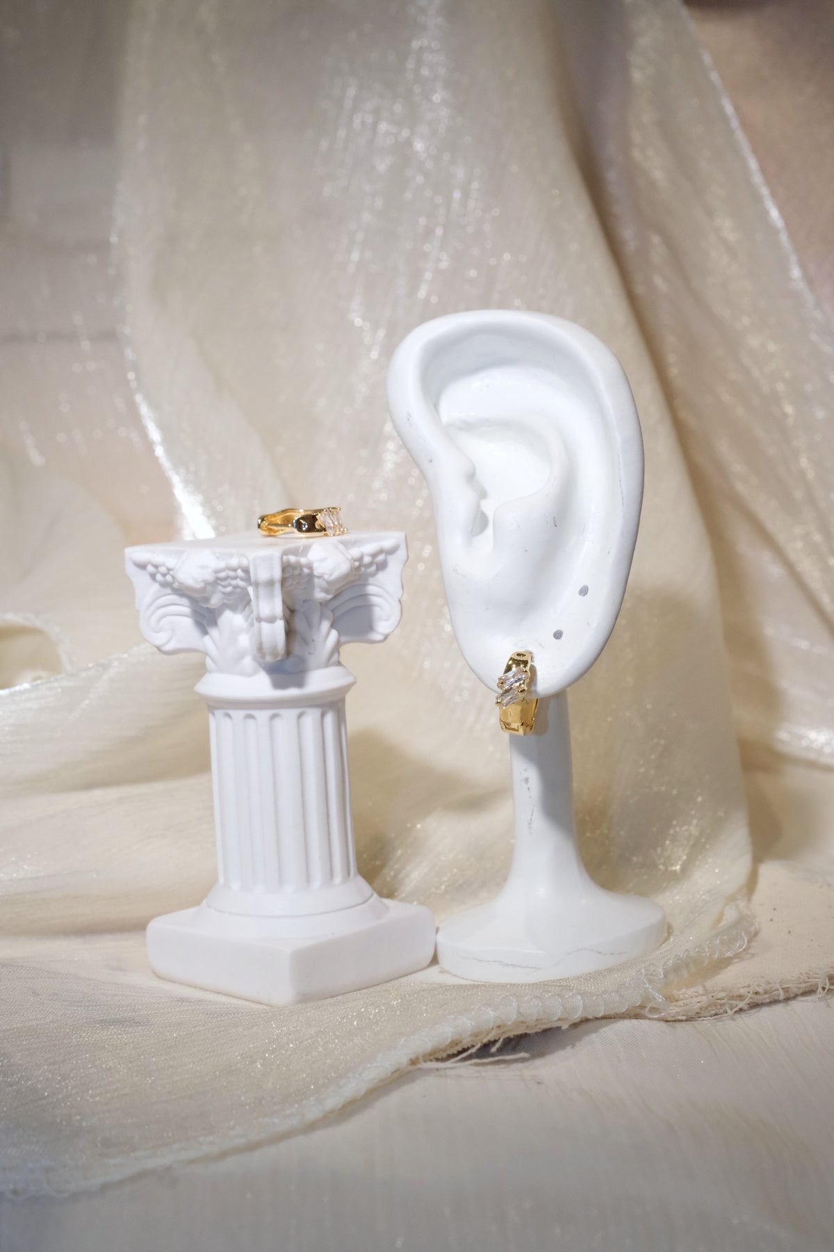 Offset Baguette CZ Huggie Earrings — Gold — edited real product photo