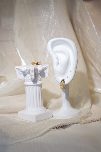 Offset Baguette CZ Huggie Earrings — Gold — edited real product photo