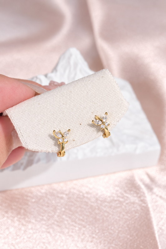 Four Stone Butterfly Huggie Hoop Earrings in stainless steel, view 1