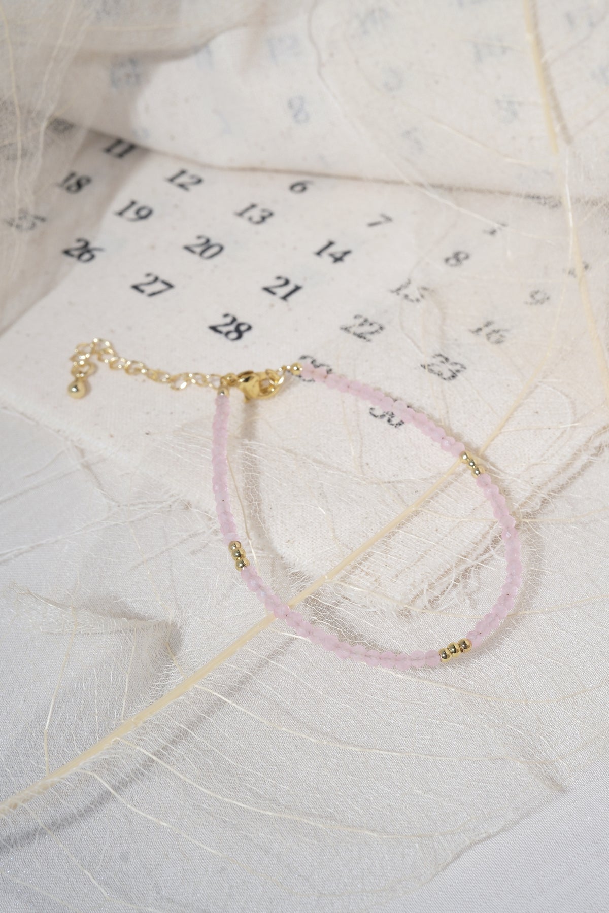 Pink Faceted Gold Tone Accent Bracelet — real product photo