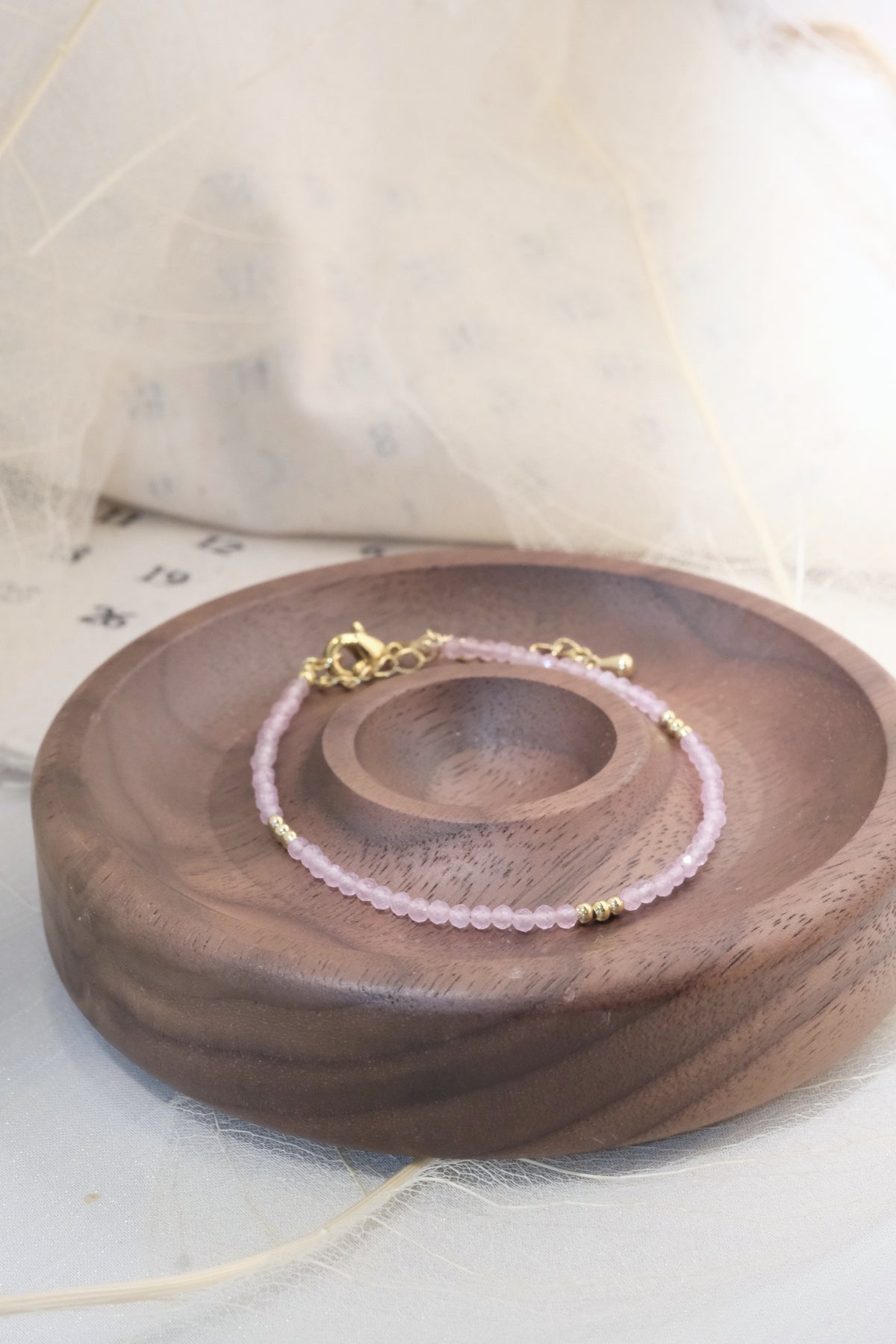 Pink Faceted Gold Tone Accent Bracelet — real product photo