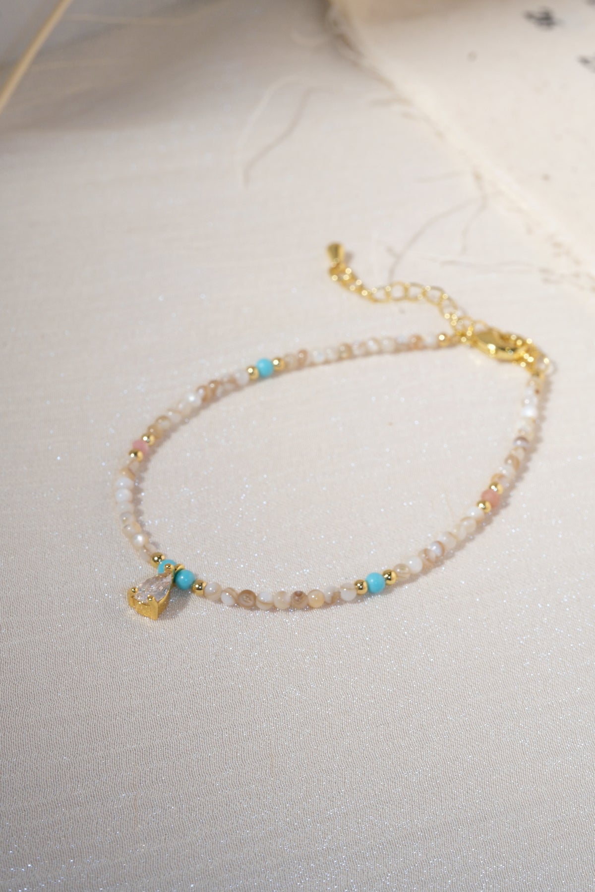 Cream Aqua Teardrop Charm Bracelet — real product photo