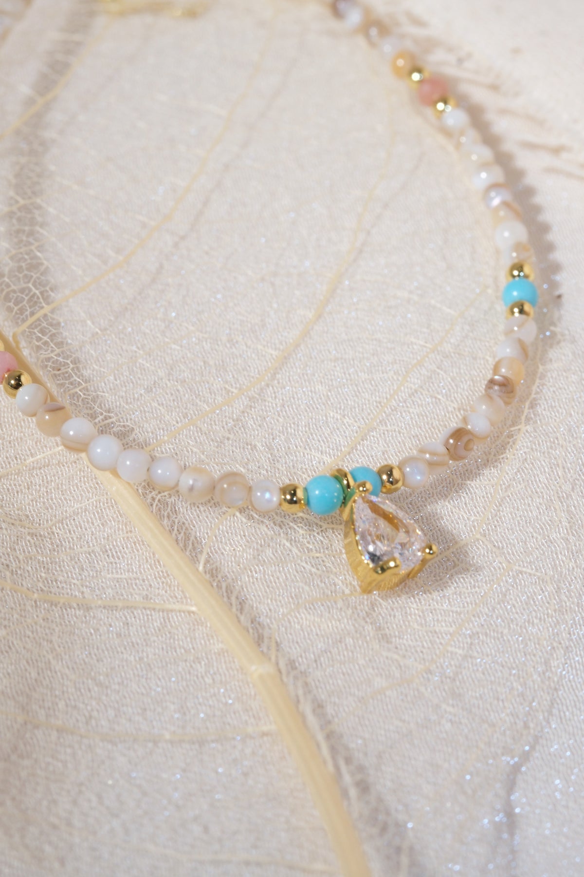 Cream Aqua Teardrop Charm Bracelet — real product photo