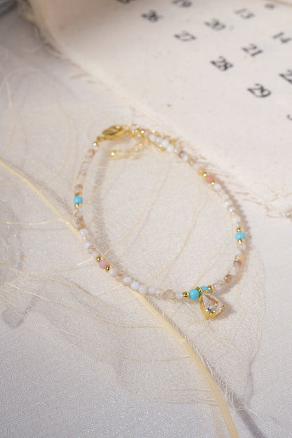 Cream Aqua Teardrop Charm Bracelet — real product photo