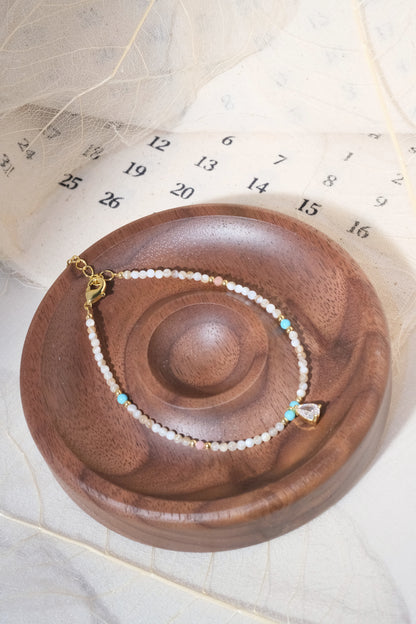 Cream Aqua Teardrop Charm Bracelet — real product photo