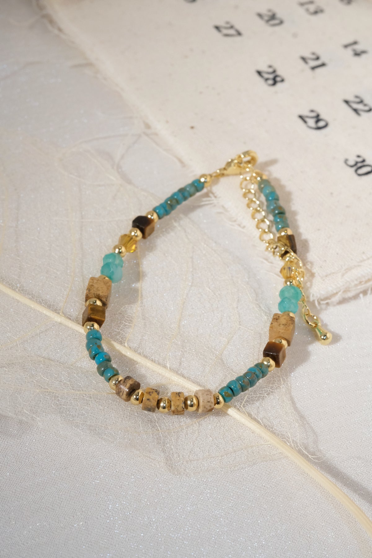 Turquoise Color Chip Gold Tone Bars Bracelet — real product photo