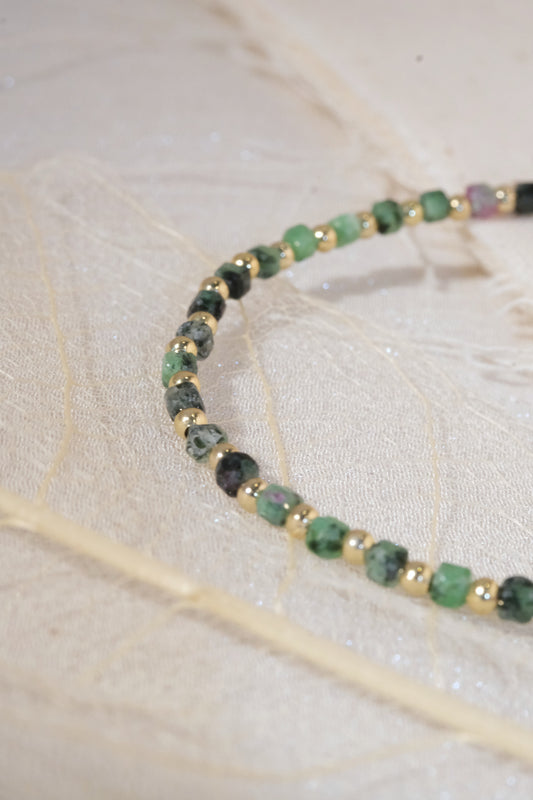 Green Round Gold Tone Spacers Bracelet — real product photo