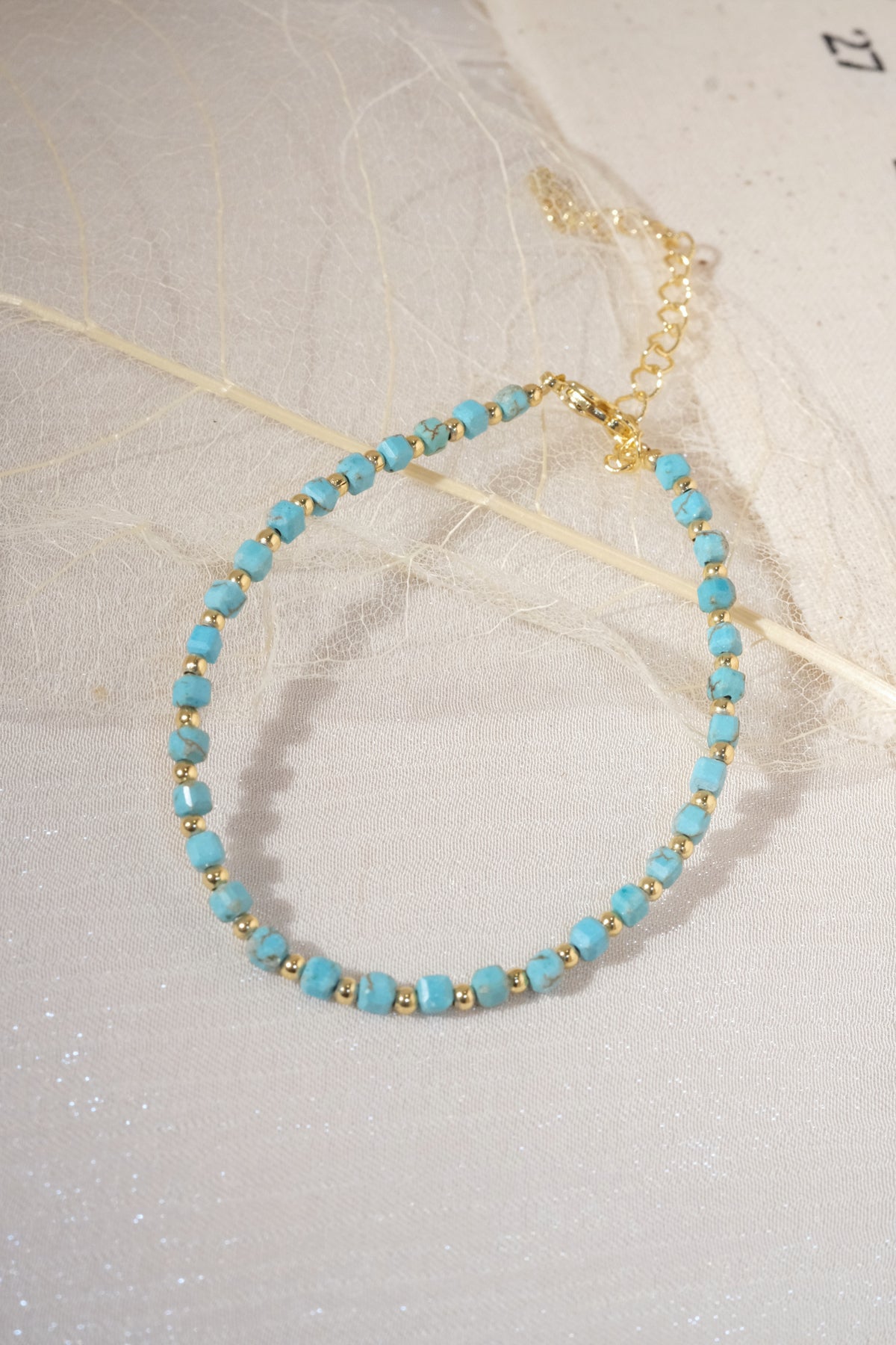 Aqua Round Gold Tone Spacers Bracelet — real product photo