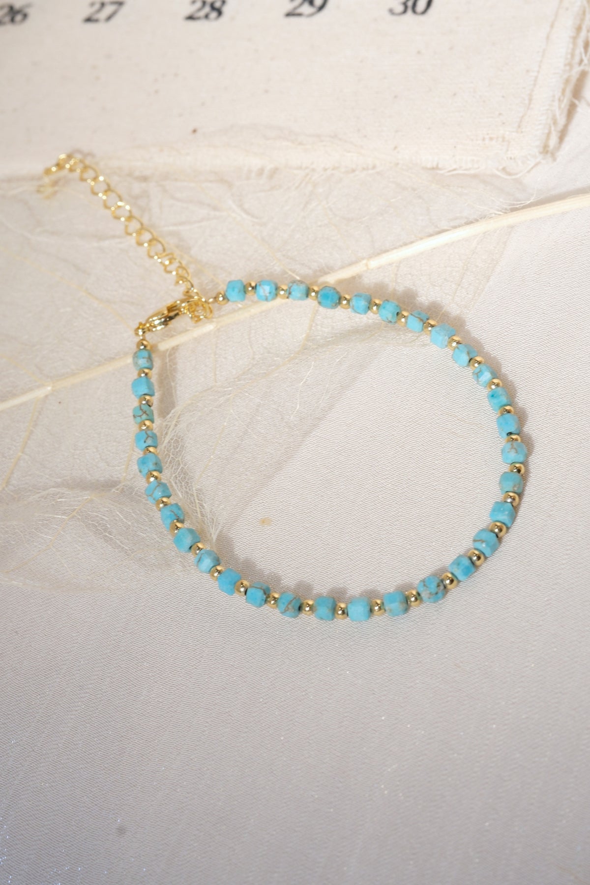 Aqua Round Gold Tone Spacers Bracelet — real product photo