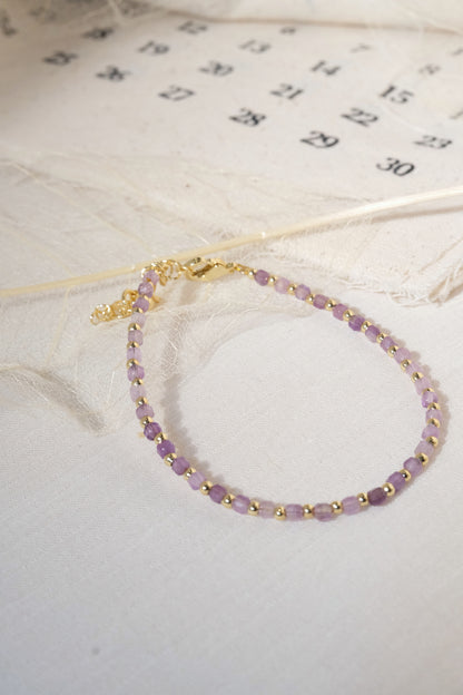 Purple Faceted Gold Tone Spacers Bracelet — real product photo
