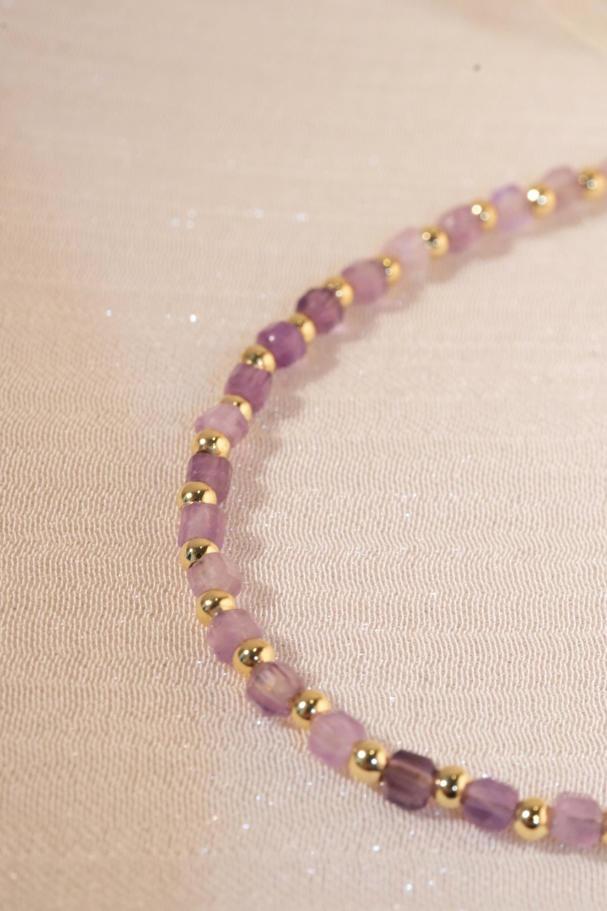 Purple Faceted Gold Tone Spacers Bracelet — real product photo