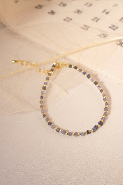 Grey Blue Gold Tone Spacers Bracelet — real product photo