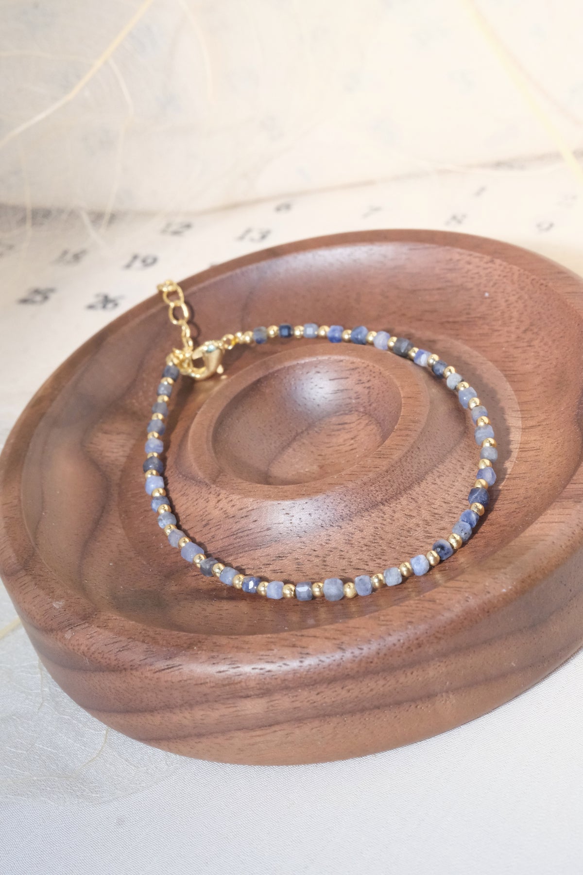 Grey Blue Gold Tone Spacers Bracelet — real product photo
