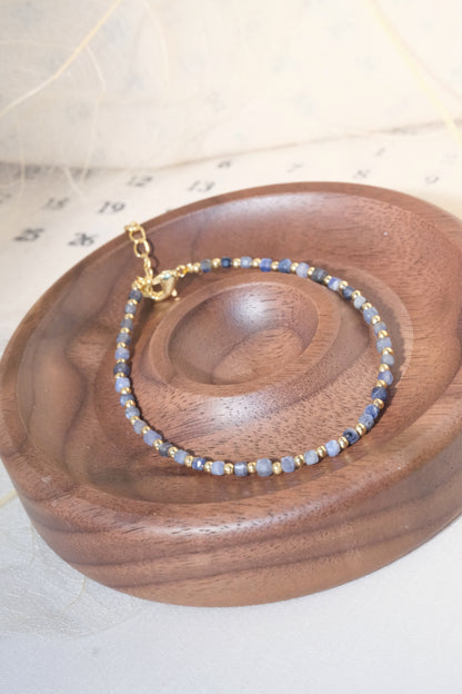Grey Blue Gold Tone Spacers Bracelet — real product photo
