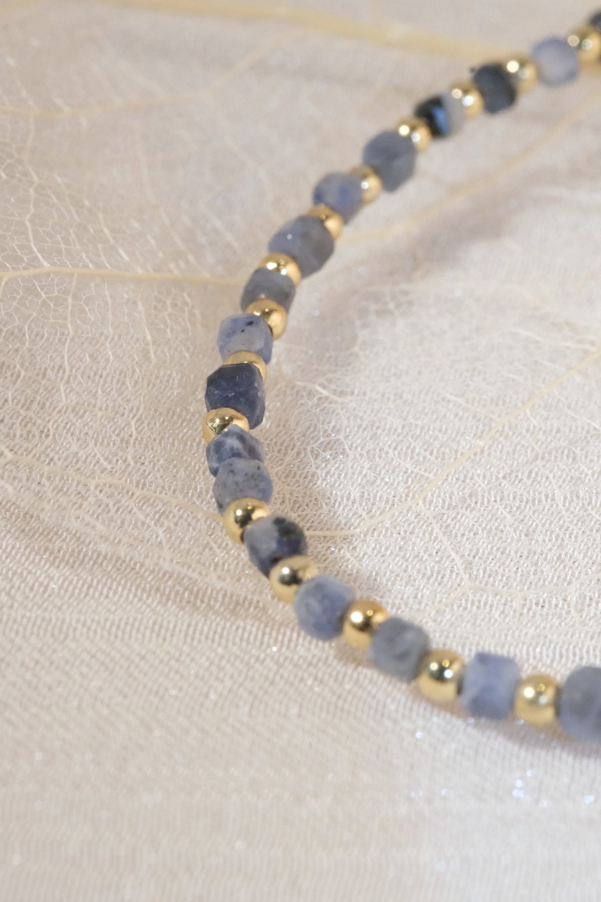 Grey Blue Gold Tone Spacers Bracelet — real product photo