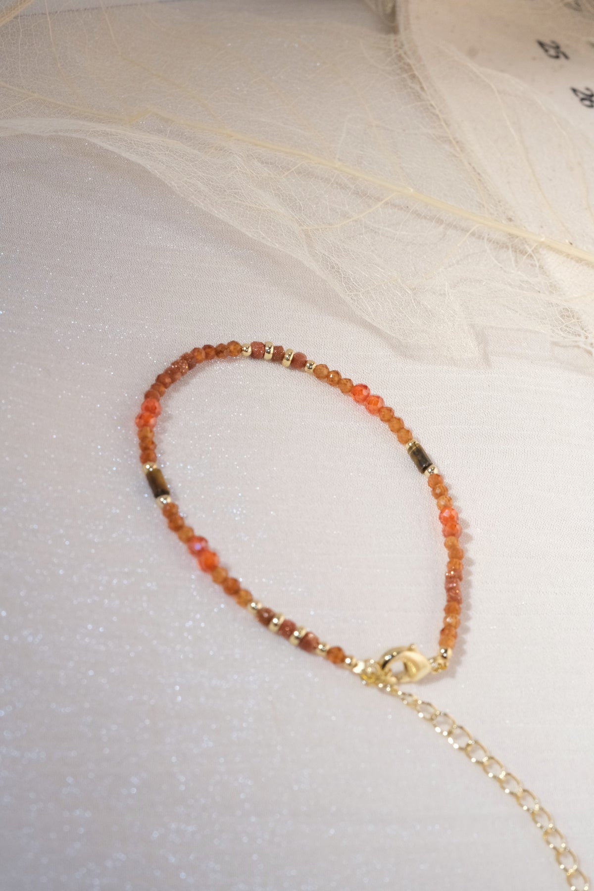 Orange Red Faceted Beads Bracelet — real product photo
