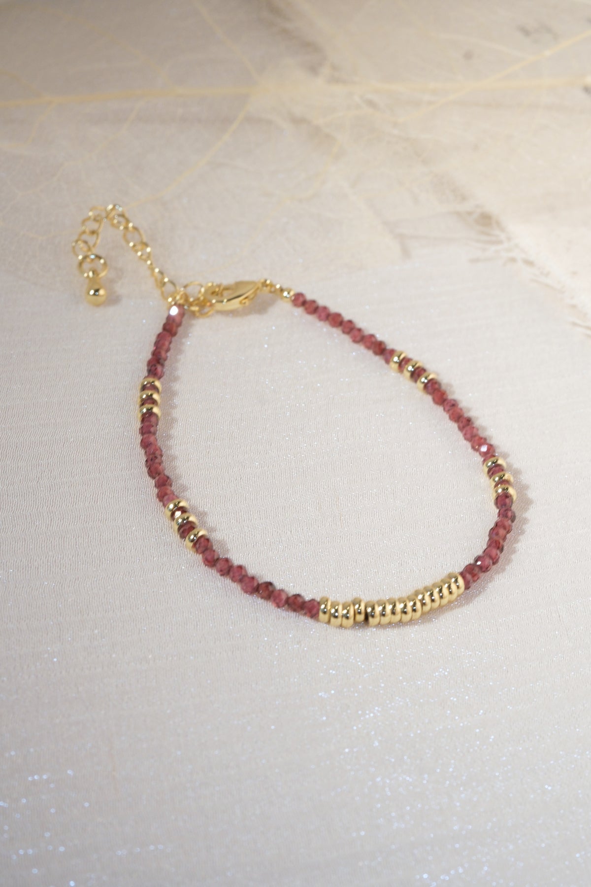 Maroon Gold Tone Ribbed Bar Bracelet — real product photo