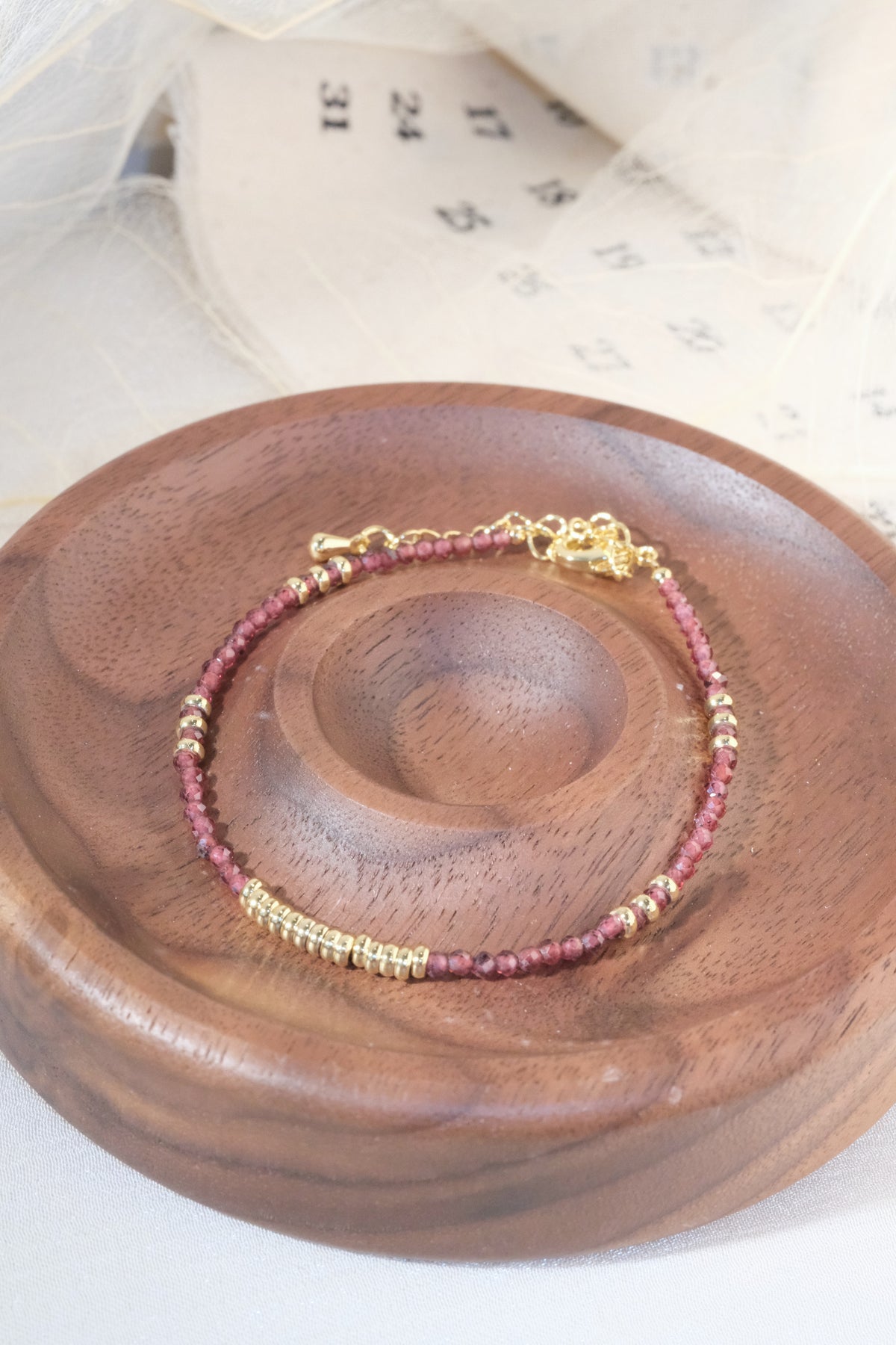 Maroon Gold Tone Ribbed Bar Bracelet — real product photo