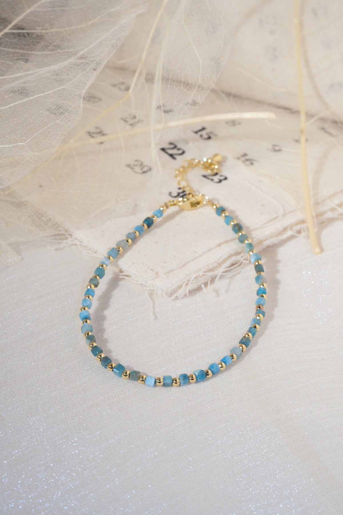 Turquoise Color Gold Tone Spacers Bracelet — real product photo
