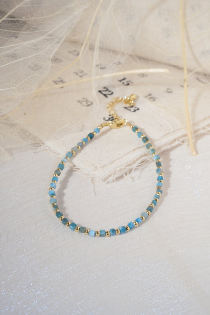 Turquoise Color Gold Tone Spacers Bracelet — real product photo