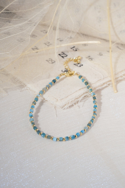 Turquoise Color Gold Tone Spacers Bracelet — real product photo