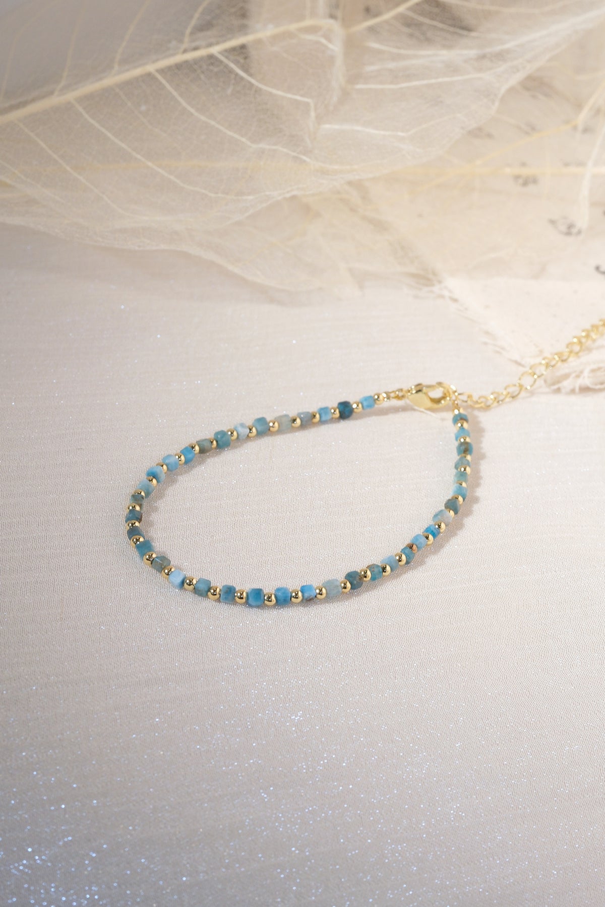 Turquoise Color Gold Tone Spacers Bracelet — real product photo