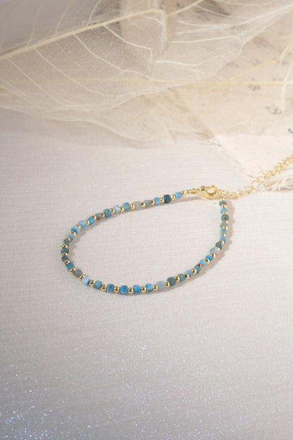 Turquoise Color Gold Tone Spacers Bracelet — real product photo