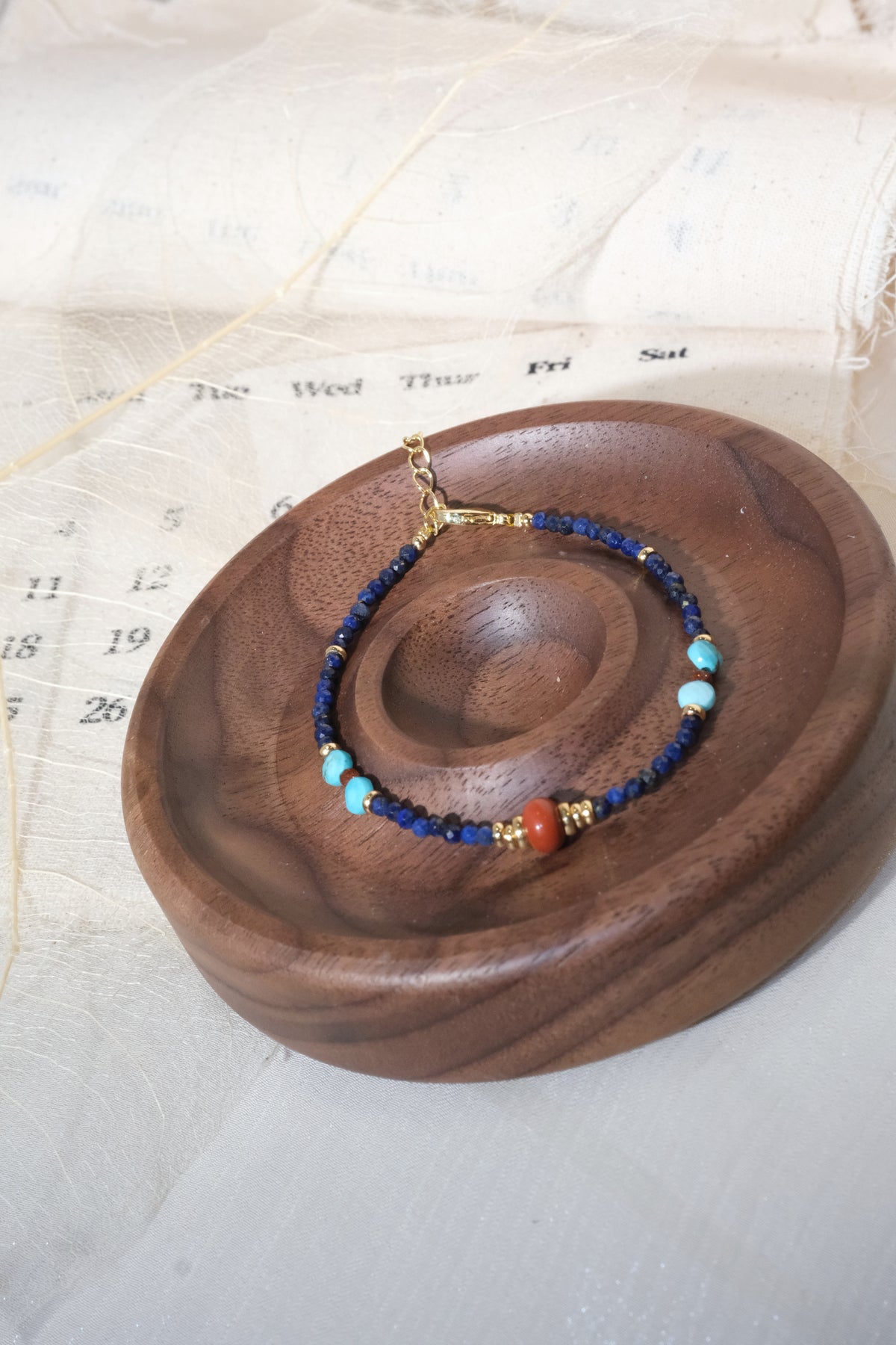 Blue Turquoise Color Red Accents Bracelet — real product photo