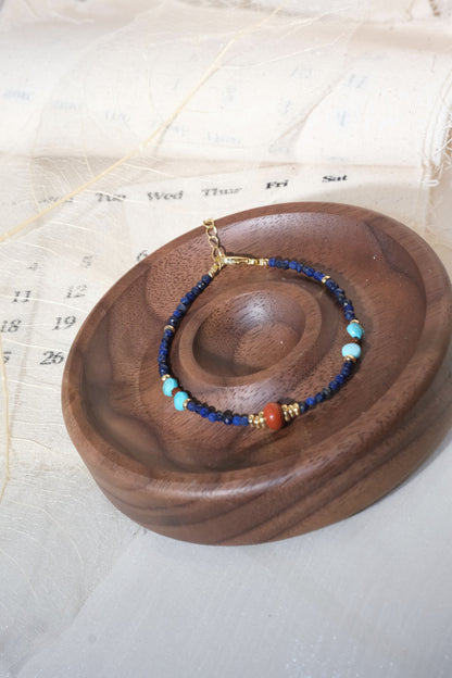 Blue Turquoise Color Red Accents Bracelet — real product photo