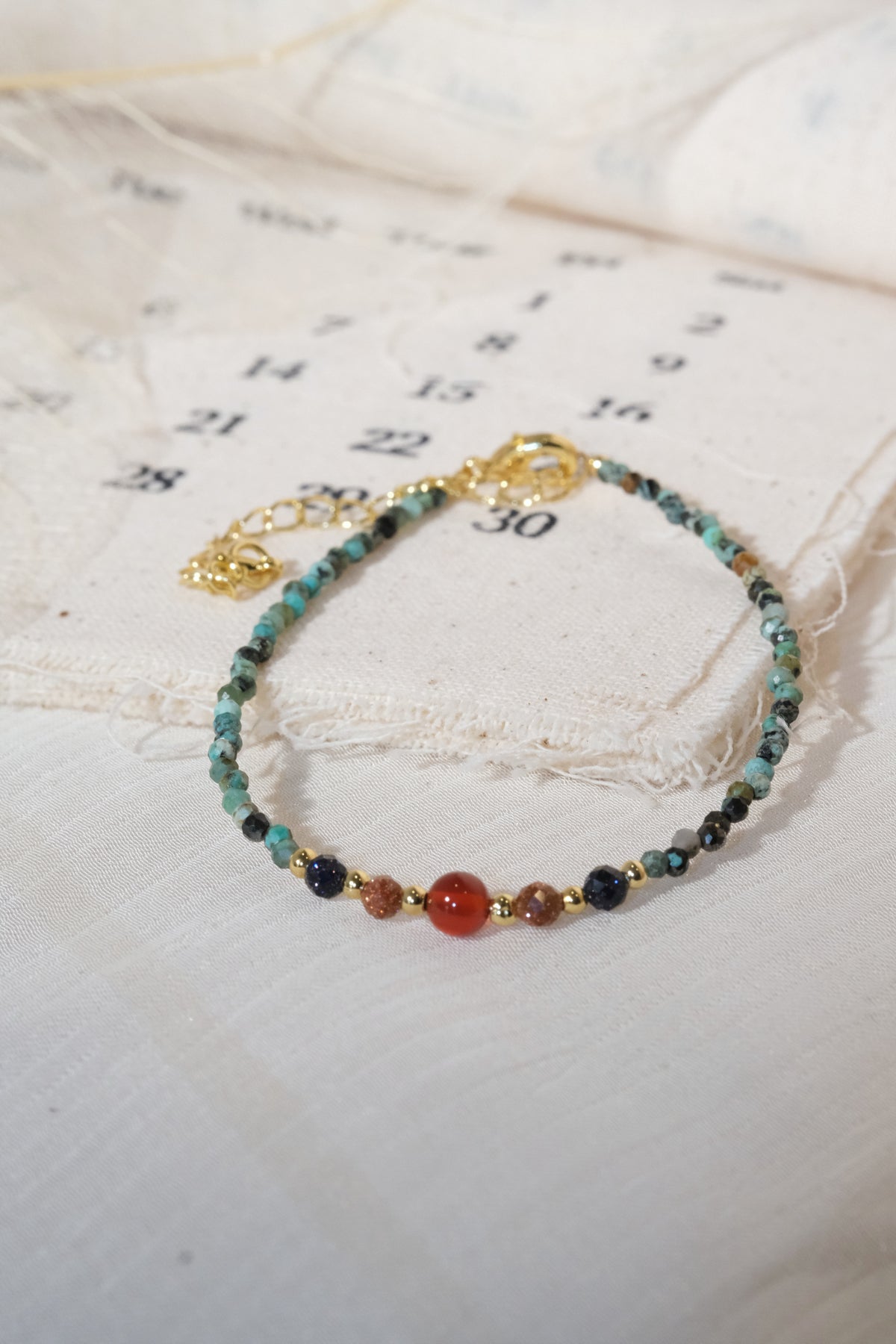 Green Red Orange Accents Bracelet — real product photo