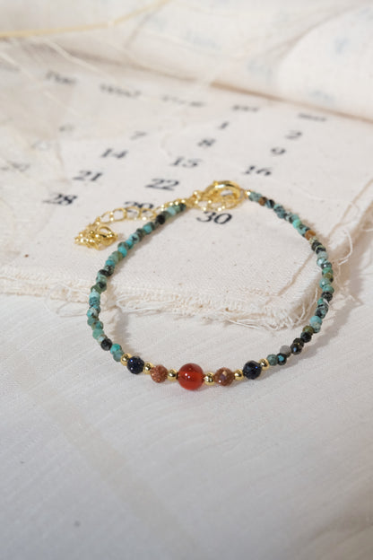 Green Red Orange Accents Bracelet — real product photo