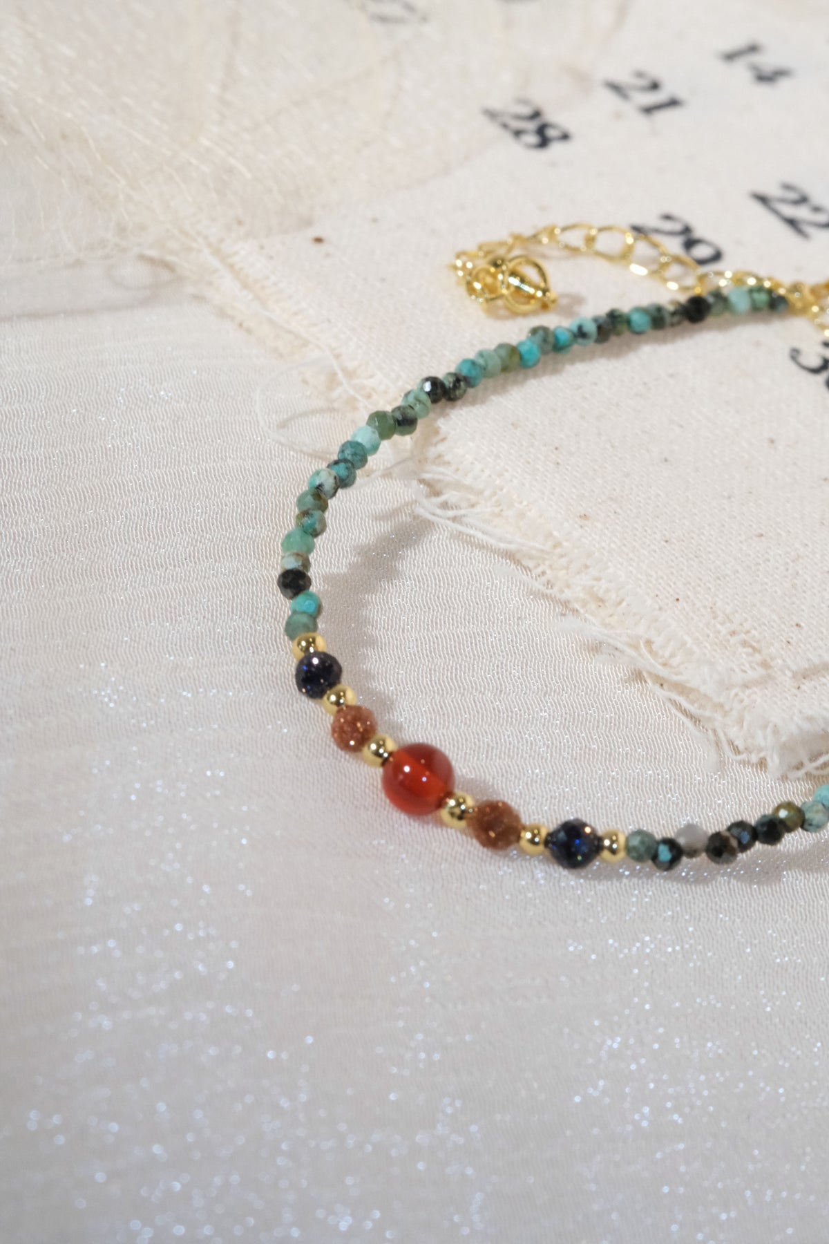 Green Red Orange Accents Bracelet — real product photo