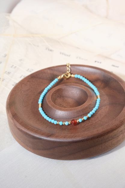 Turquoise Color Red Accents Bracelet — real product photo